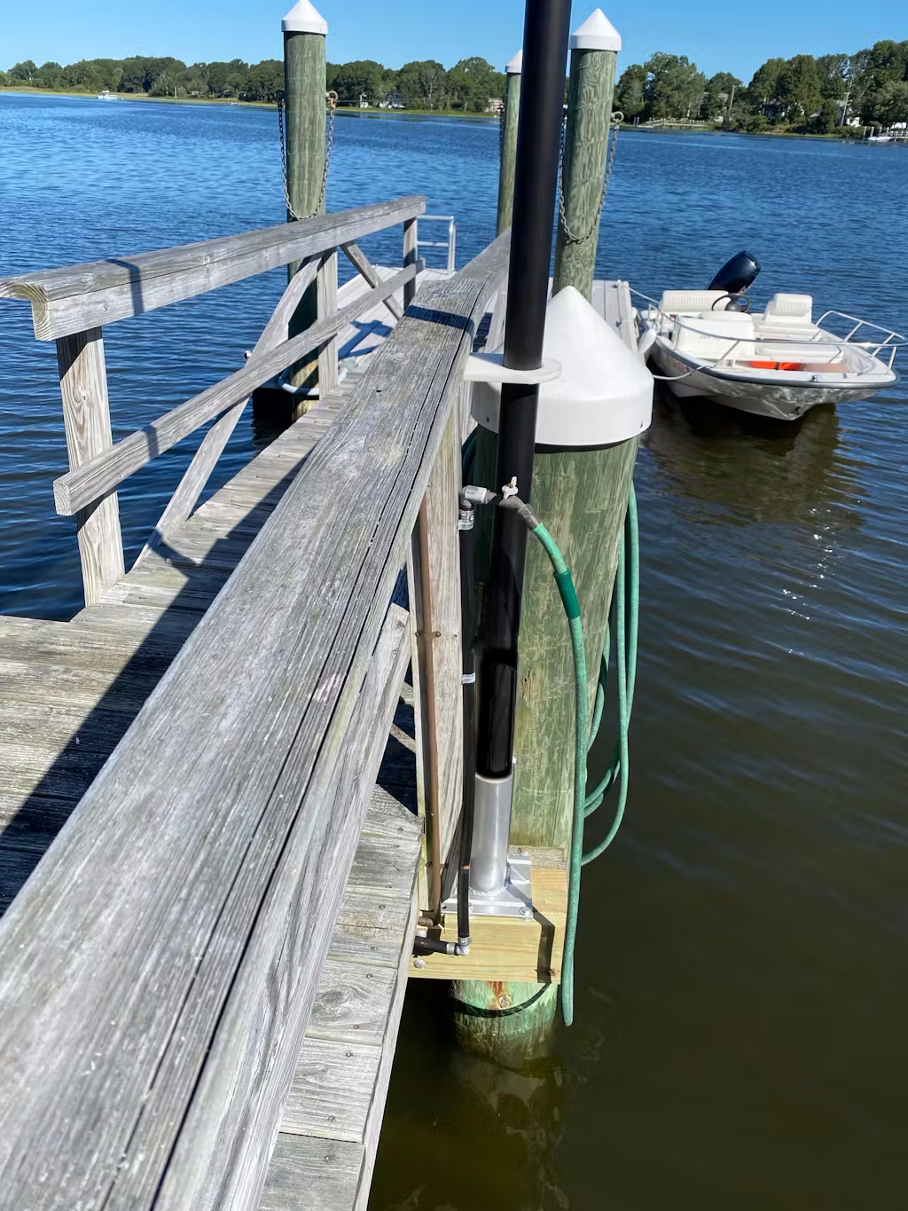 Atlantic Flag & Pole Inc. TelePatriot flagpole top mount for porch, dock, or patio, durable metal construction.