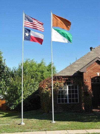 Two telescoping flagpoles with 2 flags on each pole