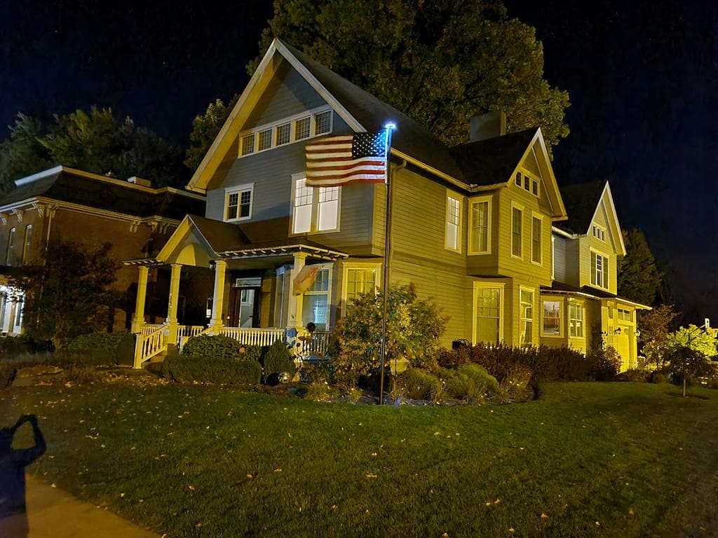 Atlantic Flagpole Telepatriot 400 Series solar flagpole light in white, designed for bright, efficient illumination