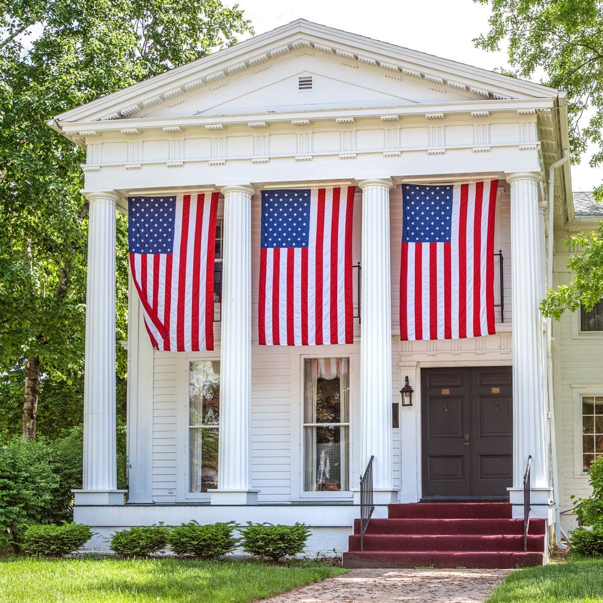 Nylon large American flag in vibrant red, white, and blue, by Atlantic Flag & Pole Inc., available in multiple sizes.
