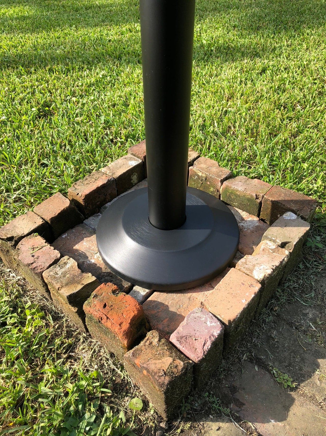 Black bronze anodized aluminum flash collar for 2.5-inch flagpole base by Atlantic Flag & Pole Inc.