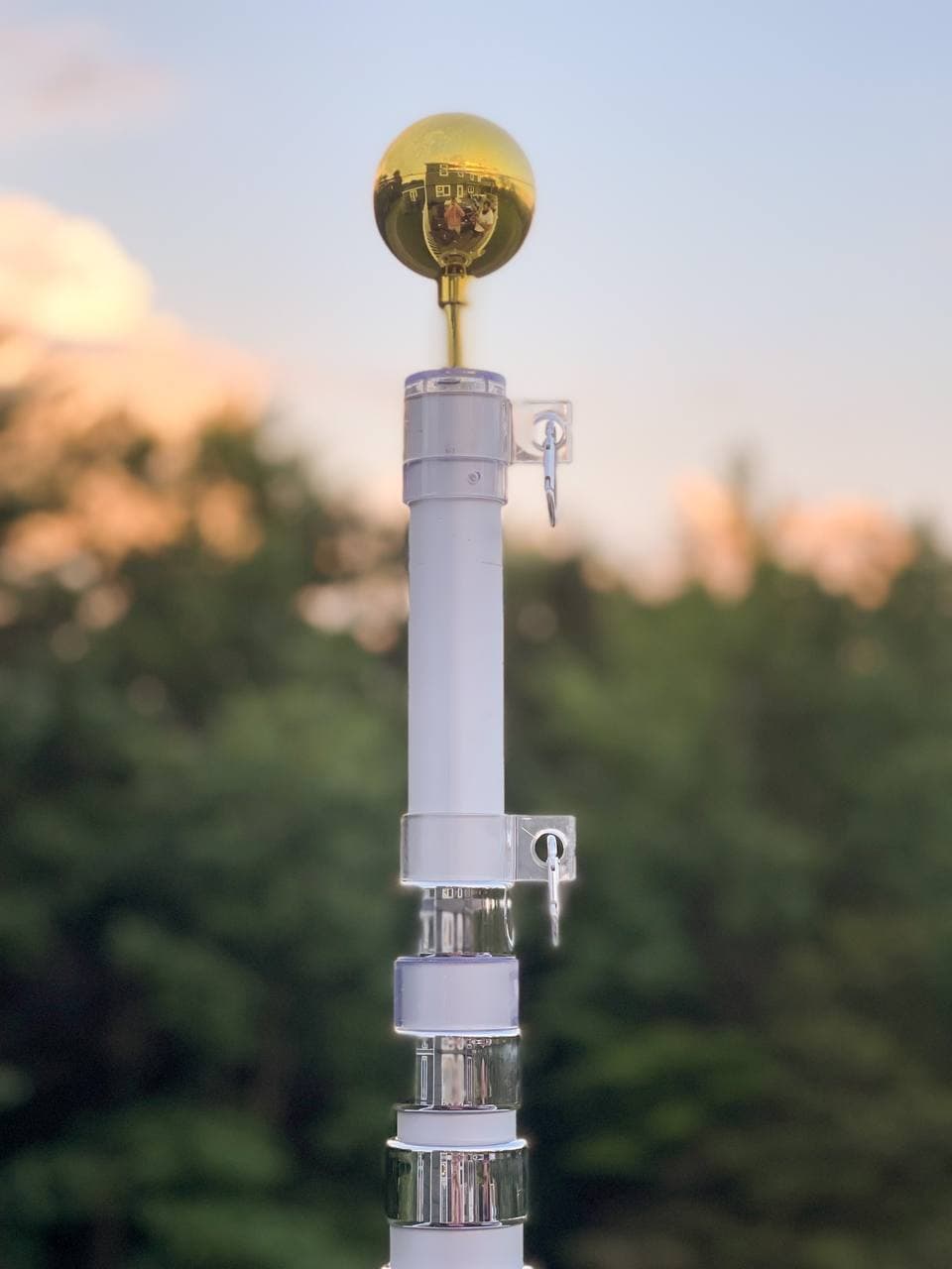 Silver 20-foot aluminum telescoping flagpole by Atlantic Flagpole