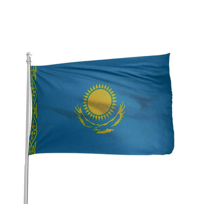 Blue and gold Kazakhstan flag by Atlantic Flag & Pole Inc., featuring the sun and eagle emblem in the center.