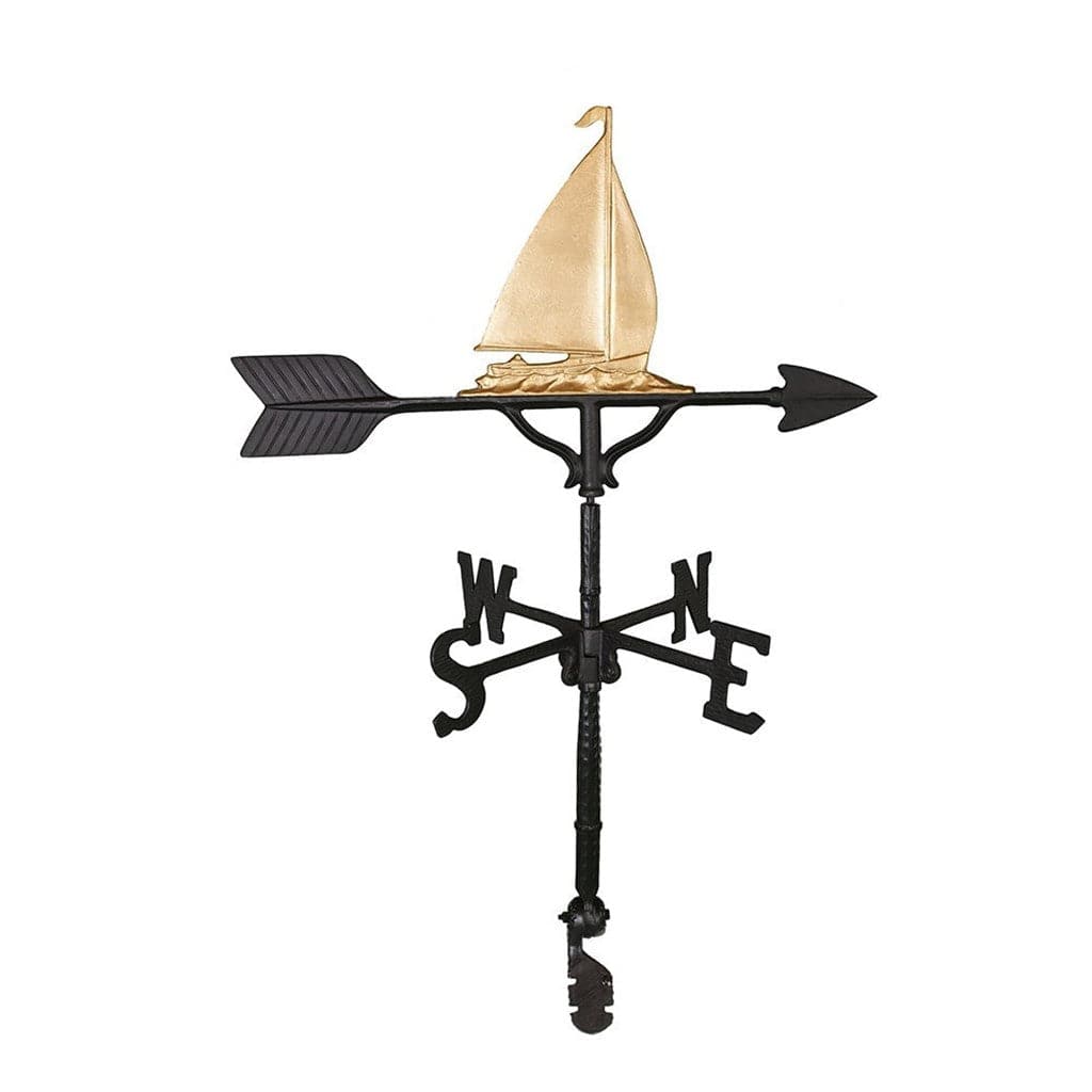 Sailboat on the water sitting on a weathervane gold